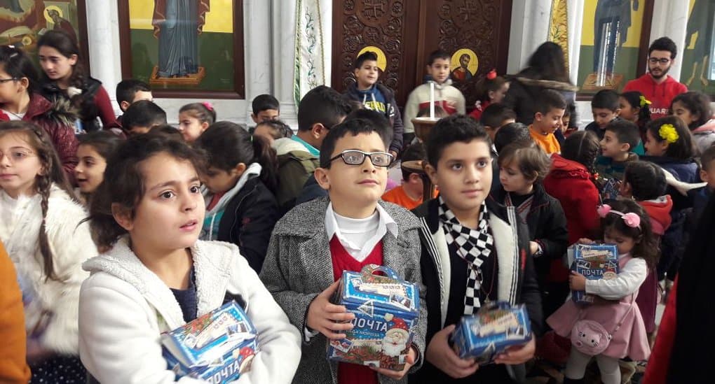 Столичный приход передал Рождественские подарки сирийским детям