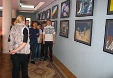 В музее Байконура проходит благотворительная фотовыставка космонавта Юрия Лончакова